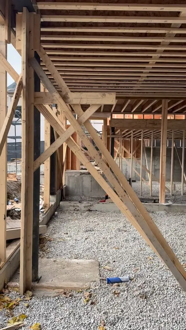 Basement steel post installed under wood framing