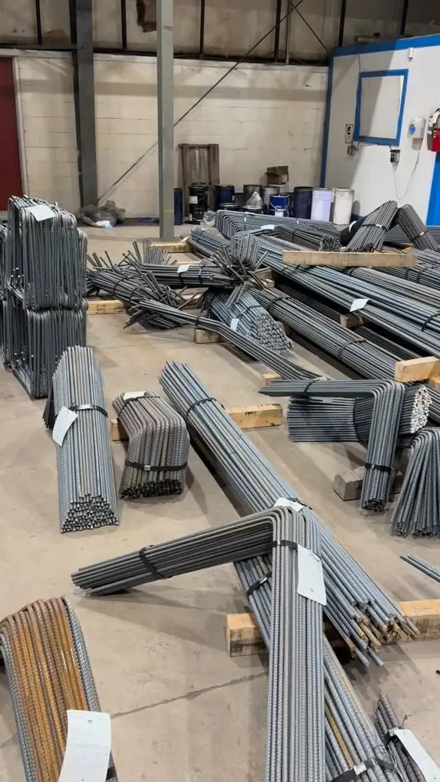 Cut and bent rebar staged in the fabrication shop