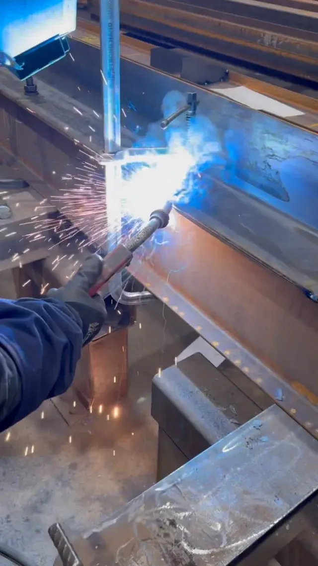 Welder fabricating structural steel in the Procut shop